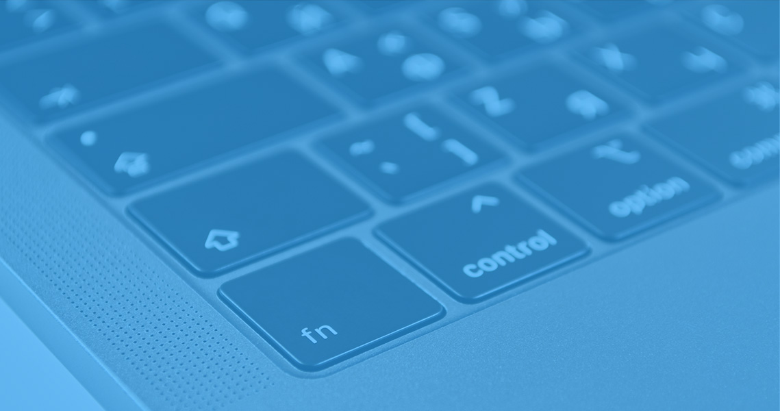 Logo photoshop avec un clavier en fond